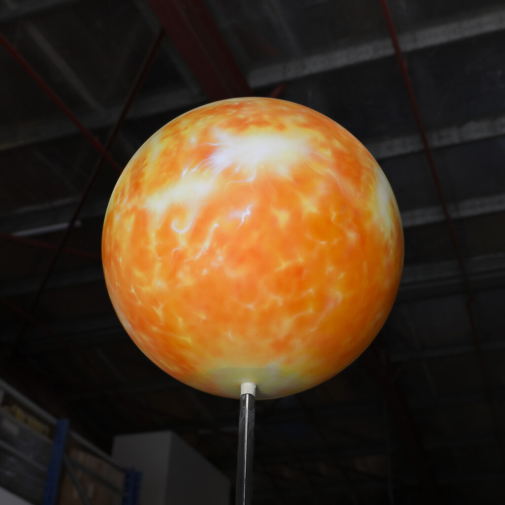 a large orange and white ball