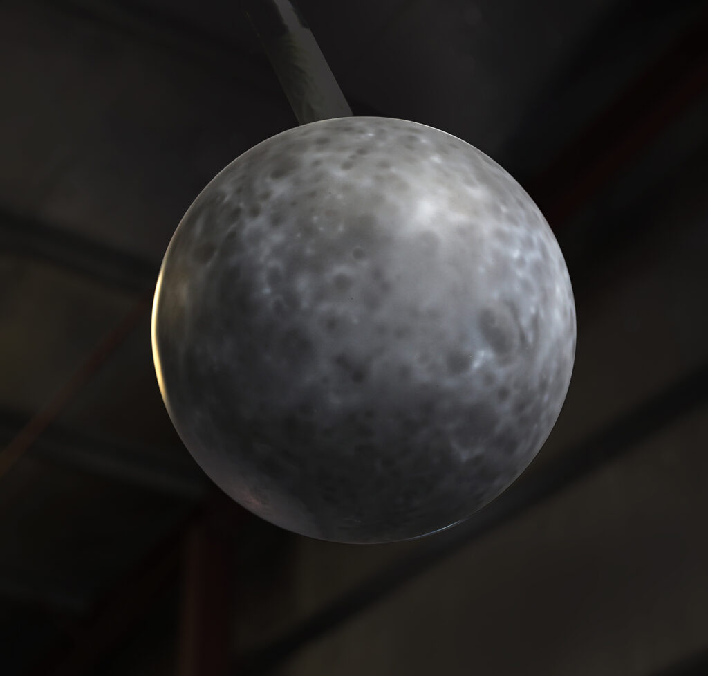 a grey ball in the air